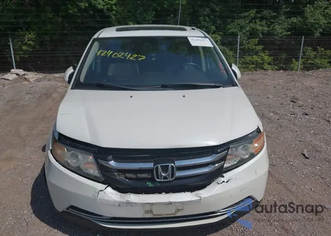 2014 Honda Odyssey Ex-L z USA, uszkodzony, nr VIN 5FNRL5H63EB131596